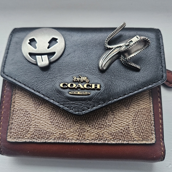 Coach Handbags - Coach Embellished Metal Pins Tri Fold Wallet – Signature Canvas & Leather